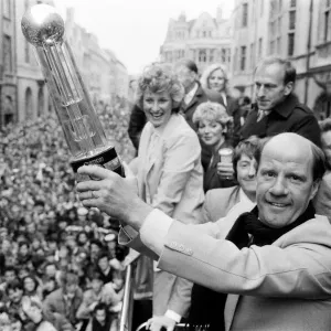 Oxford United FC manager Jim Smith, holds aloft the Second Division Championship trophy