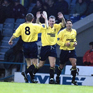 Oxfords Joey Beauchamp celebrates his winning goal against Manchester City in