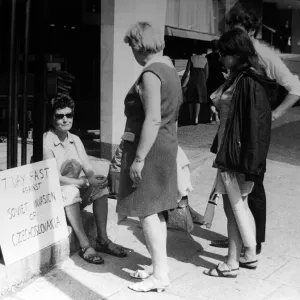 Pacifist campaigner Pat Arrowsmith asitting on the kerb outside the gates of Kensington Pacifist campaigner Pat Arrowsmith asitting on the kerb outside the gates of Kensington