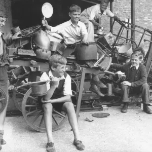 Paignton lads admiring their haul of scrap metal in a school holiday campaign called Paignton lads admiring their haul of scrap metal in a school holiday campaign called