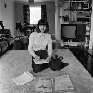 Pam Ayres replies to fan mail in her lounge at her home in a village in Oxfordshire
