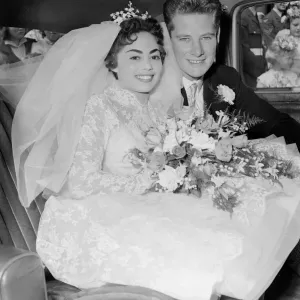 Pamela and David Moore seen here in the car on their way to the their reception in West Pamela and David Moore seen here in the car on their way to the their reception in West