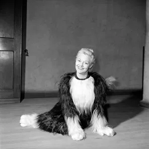 Pantomime cat: Actress Jeanie Craig as Tommy the cat in Dick Whittington. December 1956