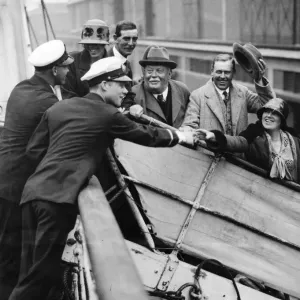 Five of the party of six Daily Mirror guests bidding goodbye to officers of the liner Five of the party of six Daily Mirror guests bidding goodbye to officers of the liner