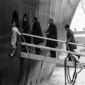 Passengers boarding the Queen Elizabeth II cruise liner after her arrival in Southampton