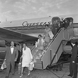 Passengers disembarking from an Overseas Aviation charter flight from the continent to