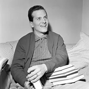 Pat Boone 22, American singer, actor, writer and student has sold over 14, 000