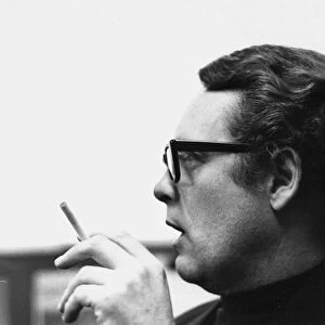 Patrick McGoohan British actor wearing glasses smoking June 1968