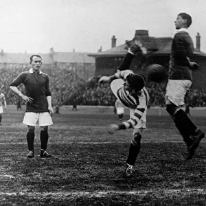 Patsy Gallacher in action for Celtic against Heart of Midlothian. Circa 1911