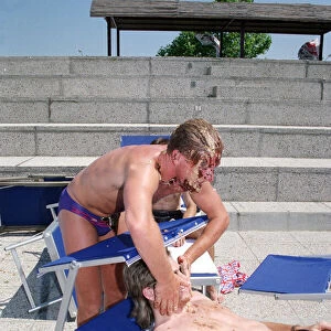 Paul Gascoigne seen here playing about beside the pool at the England Teams hotel in