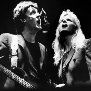 Paul & Linda McCartney with their band Wings performing at the Royal Court Theatre