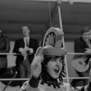 Paul McCartney from The Beatles rehearsing for the filming of
