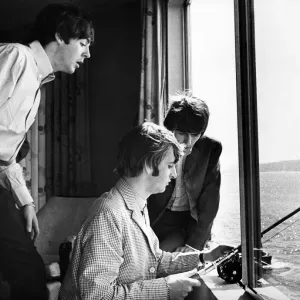 Paul McCartney, George Harrison and Ringo Starr fishing in Puget Sound from their hotel Paul McCartney, George Harrison and Ringo Starr fishing in Puget Sound from their hotel