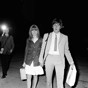 Paul McCartney and girlfriend Jane Asher return to London Airport after a holiday in