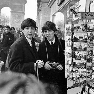 Paul MCCartney (left), George Harrison and John Lennon on the Champs Elysees before Ringo
