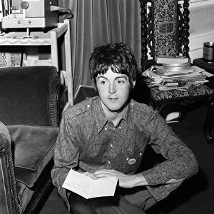 Paul McCartney opens up birthday cards from his fans on his 25th birthday. 18 June 1967