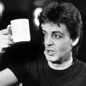 Paul McCartney pictured relaxing with a cup of tea, after the Wings concert Paul McCartney pictured relaxing with a cup of tea, after the Wings concert