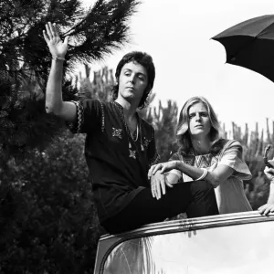 Paul McCartney and his wife Linda in Paris, France, with other members of the group Wings Paul McCartney and his wife Linda in Paris, France, with other members of the group Wings