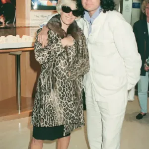 Print of Paula Yates and Michael Hutchence at Heathrow Airport with Heavenly Hiraani Tiger Lily