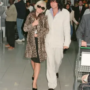 Paula Yates and her boyfriend, INXS singer Michael Hutchence leave Heathrow Airport for