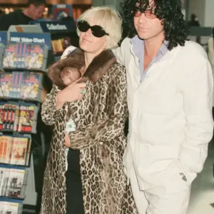 Paula Yates and her boyfriend, INXS singer Michael Hutchence leave Heathrow Airport for
