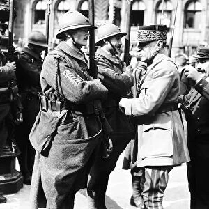 Peace Celebrations in Paris - Marshall Fock decorates a French soldier