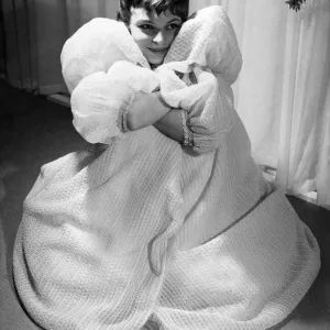 Peeping through this glamorous negligee in fancy nylon tricot Peeping through this glamorous negligee in fancy nylon tricot