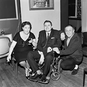 Peggy Mount and Sid James with the scriptwriter of the new TV series "