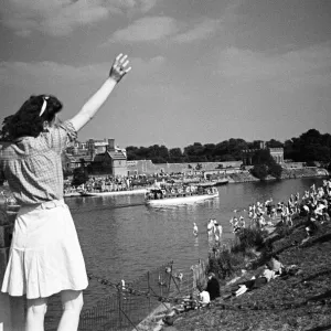 People enjoy the sunny weather at Hampton Court Palace, Greater London. circa 1945 People enjoy the sunny weather at Hampton Court Palace, Greater London. circa 1945