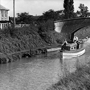 People enjoying a trip down the canal. September 1956