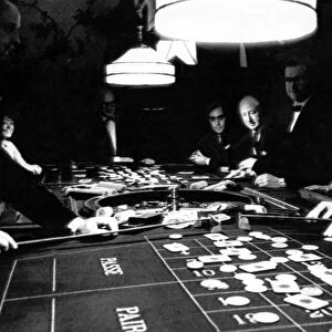 People gambling and playing roulette in a casino in May 1967