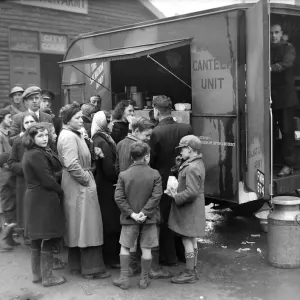 People gather around the mobile canteen van situated at the Salvation Army in Coventry People gather around the mobile canteen van situated at the Salvation Army in Coventry