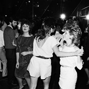 People having a fun at "Scarletts"club. 1983