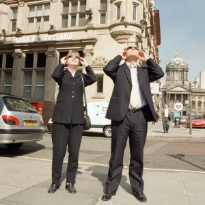 People in Liverpool city centre watching the solar eclipse. 11th August 1999