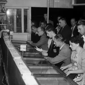People playing the Twenty One Game in a Sixpenny Casino stall in Blackpool People playing the Twenty One Game in a Sixpenny Casino stall in Blackpool