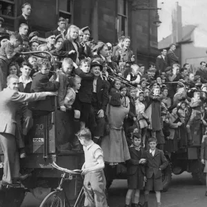 People on the streets celebrate the The VJ day victory parade in Newcastle at the end of People on the streets celebrate the The VJ day victory parade in Newcastle at the end of