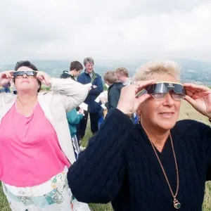 People watching a total solar eclipse, Caerphilly mountain. 11th August 1999