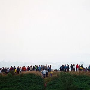 People watching a total solar eclipse, Caerphilly mountain. 11th August 1999