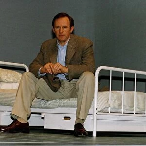 Peter Davison Actor in the Last Yankee sitting on a bed