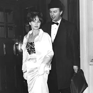 Peter Hall and Leslie Caron arrive at theatre premiere - January 1963