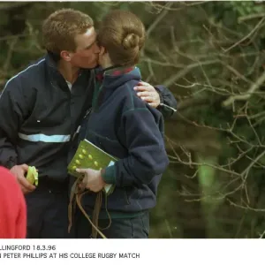 Peter Phillips gives his mother Princess Anne a kiss at his college rugby match