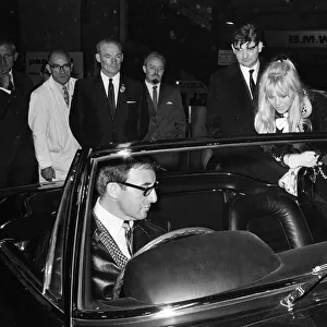 Peter Sellers and Brit Ekland at the British International Motor Show in London 19th