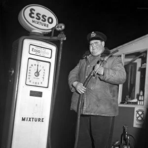 Petrol pump attendant December 1953 D7665