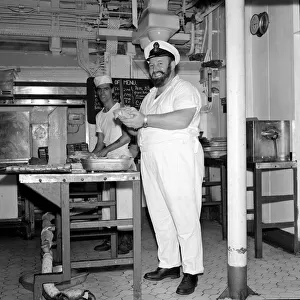 Petty Officer Alexander reid, a cook on board HMS Ark Royal seen in the galley as