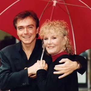Petula Clark and David Cassidy Print under Umbrella