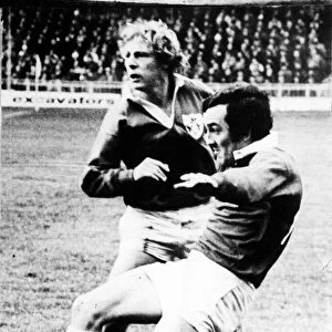 Phil Bennett, rugby player of Llanelli and Wales. pictured in action for Wales against