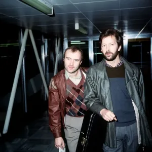 Phil Collins Singer Songwriter Actor with Eric Clapton leaving London Airport for Phil Collins Singer Songwriter Actor with Eric Clapton leaving London Airport for