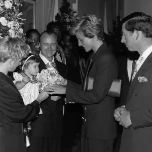 Phil Collins singer with wife Jill and daughter Lily in 1990 meet Princess Diana