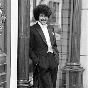 Phil Lynott of Thin Lizzy modelling clothes from Saville Row, London