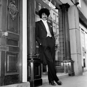 Phil Lynott of Thin Lizzy modelling clothes from Saville Row, London Phil Lynott of Thin Lizzy modelling clothes from Saville Row, London